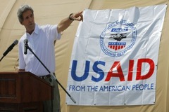 John Kerry, USAID Landgrabbing